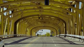 Golden Bridge in Sacramento California shot from moving vehicle with MoVi. Tilting up
4k Stock Video clip