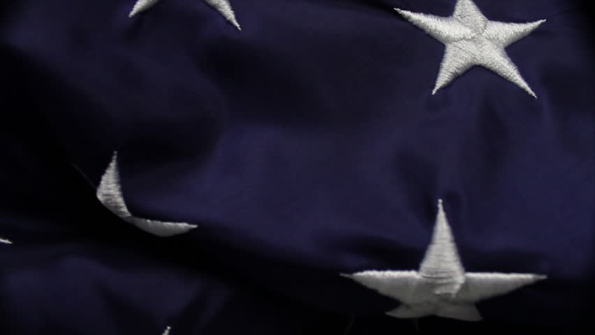 Close-up of Silver Stars on Blue Background