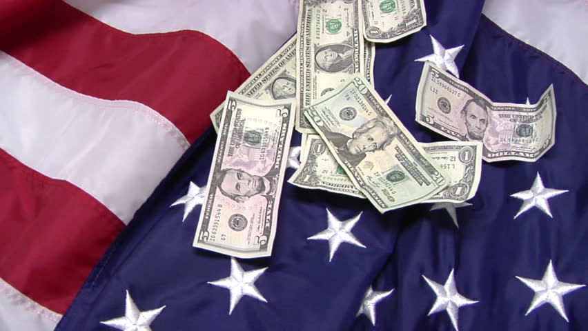Dollar Bills on an American Flag