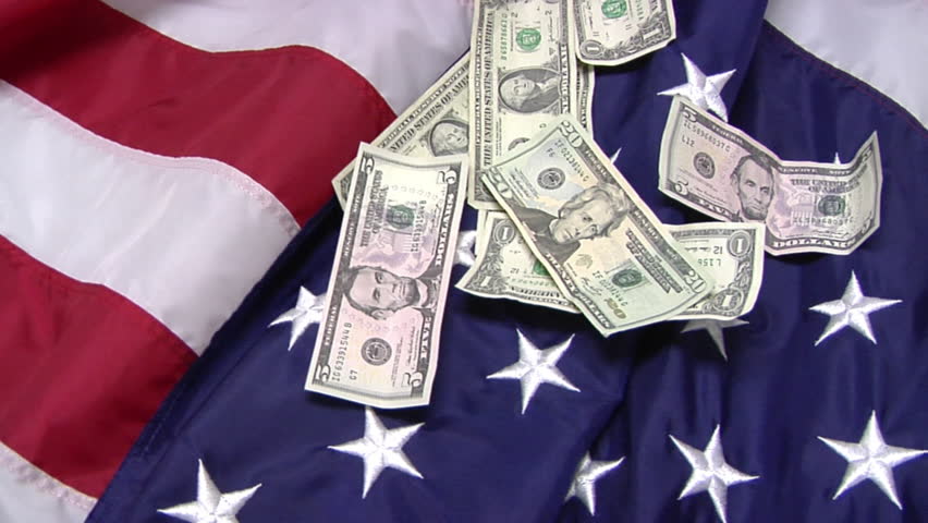 Dollar Bills on American Flag
