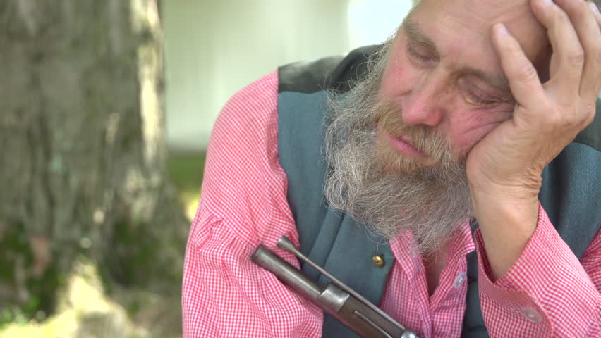 View of Civil War soldier sleeping with gun