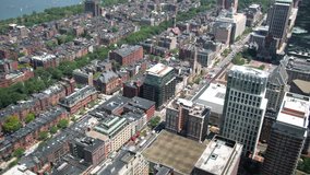 Aerial footage of buildings and streets seen from Prudential Tower at Boston
