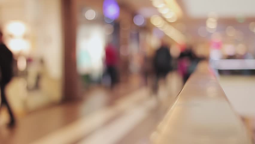 Blurred background shopping mall. People pass by, shoping Royalty-Free Stock Footage #20337115