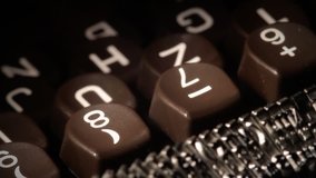 Typewriter. Close-up of keys. Finger tapping in key. Detail. Clip ID: type-detal-4_HD