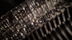 Typing. Metal types in the typewriter. Close-up.  Detail. Clip ID: type-detal-2_HD 