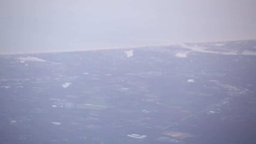 Aerial view of water and land.