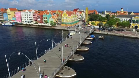 Aerial lift overview of Queen Emma Bridge and Punda in Curacao