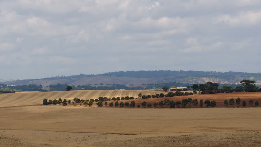 Farm fields, time-lapse with zooming