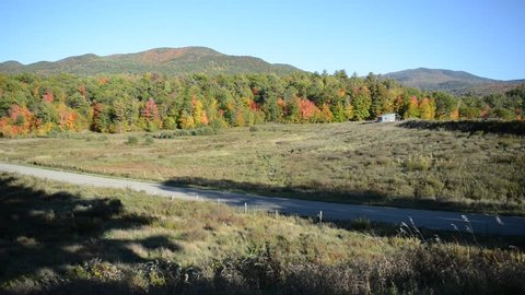 Rural wilderness scene in the Adirondacks with forest and Fall foliage 