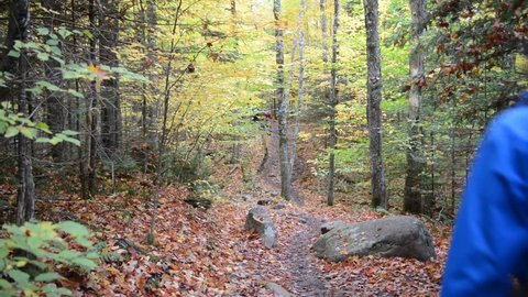 KEENE, NEW YORK CIRCA OCTOBER 2016. Despite its distance from any major cities, autumn often brings throngs of hikers and climbers to the Adirondacks to see the foliage and get some fresh air.