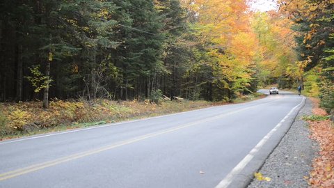 KEENE, NEW YORK CIRCA OCTOBER 2016. Despite its distance from any major cities, autumn often brings throngs of hikers and cyclists to the Adirondacks to see the foliage and get some fresh air.