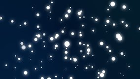 Sparkly white dot particles moving across a dark blue gradient background imitating falling snow.
