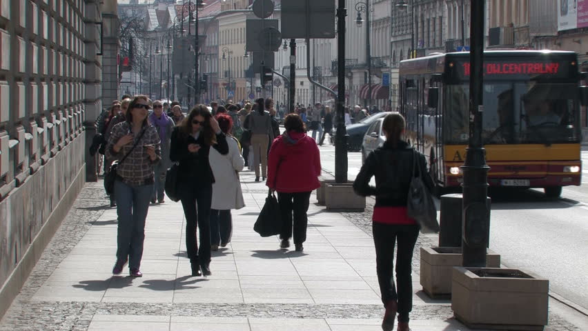 WARSAW - CIRCA OCTOBER 2011: Unidentified pedestrians walk on the Krakowskie