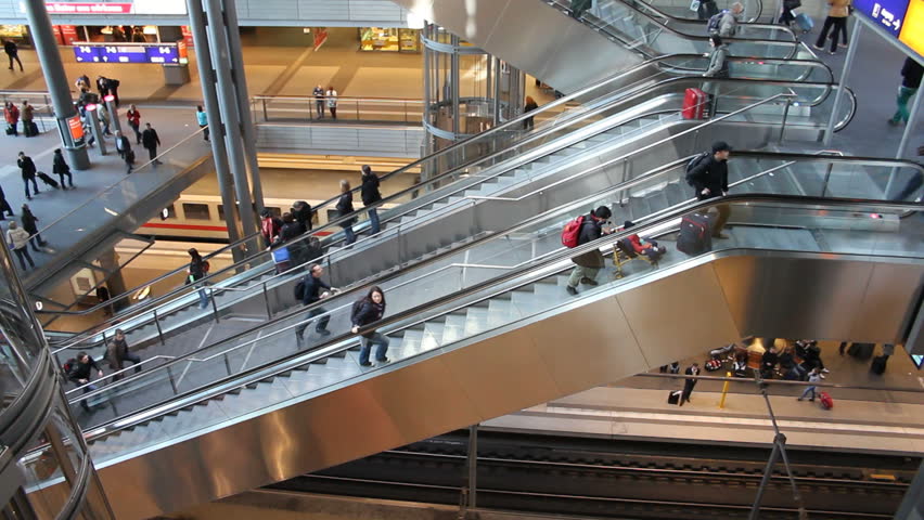 Commuters descend an escalator at a Berlin metro station circa April 2011