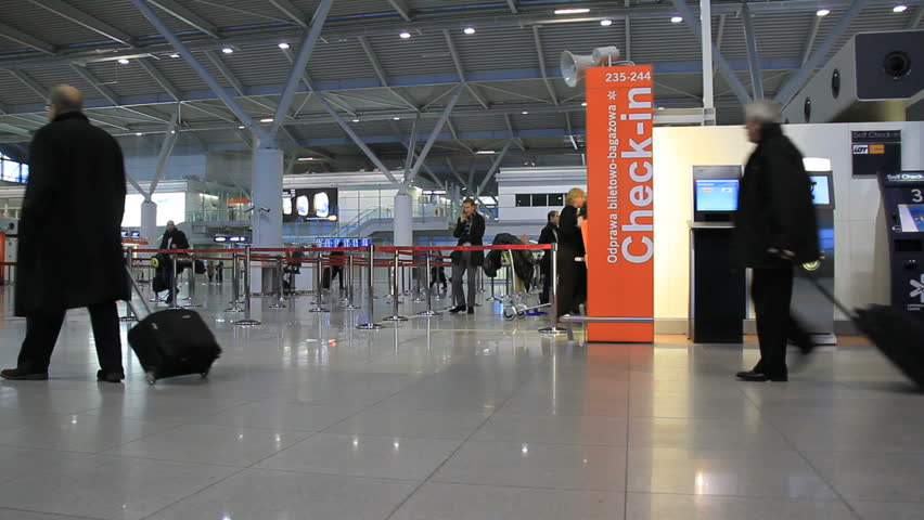 WARSAW - CIRCA JUNE 2010: Unidentified travellers at the Fryderyk Chopin Aiport