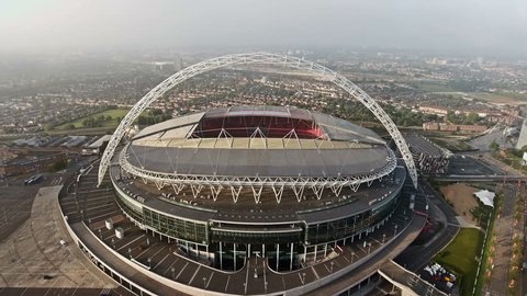 LONDON, UK - OCT 10 : Wembley Stadium on October 10, 2016 in London, England. Aerial View of Wembley Stadium, Soccer Arena Flying By Drone Shot in London 4K UHD Footage