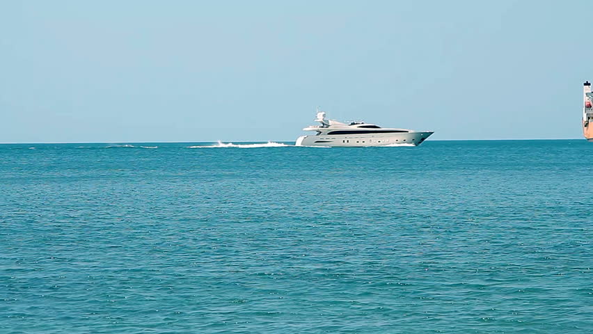 Novorossiysk, Russian Federation â?? July 06, 2016: Luxury white speed yacht in open waters | Shutterstock HD Video #20435917
