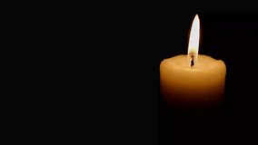 Blow Out White Candle Over Black Background.