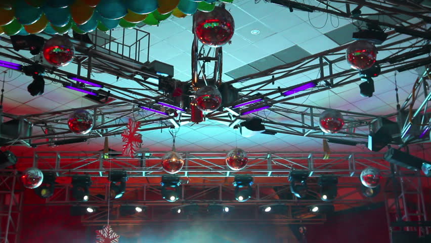 lighting equipment  at concert - colored spotlights on ceiling