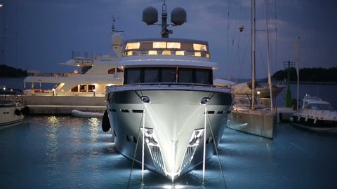 ISLAND OF SOLTA, CROATIA - SEPTEMBER 9, 2016: Large white expensive yacht in marina waiting for owner in the night time