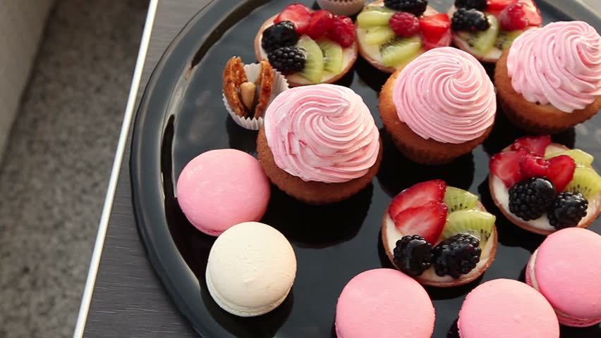 sweets and cakes on a platter, top view, Festive buffet at the event with desert, 