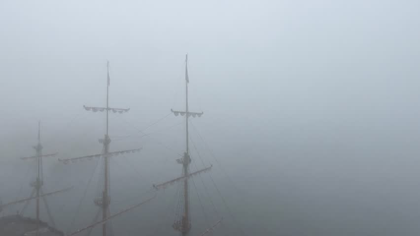 Tall ship wooden mast in fog