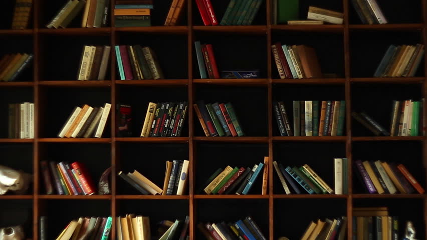 Bookshelves in university library with lots of books Royalty-Free Stock Footage #20462512