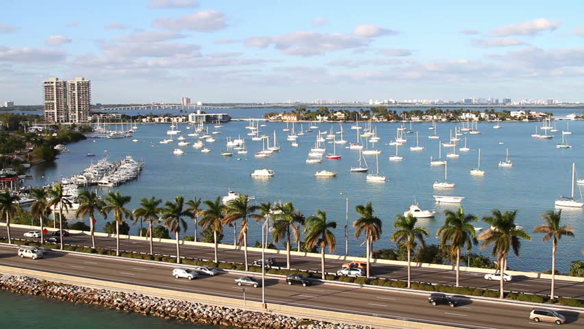 sailboats in miami bay area on a beautiful summer day, aerial view