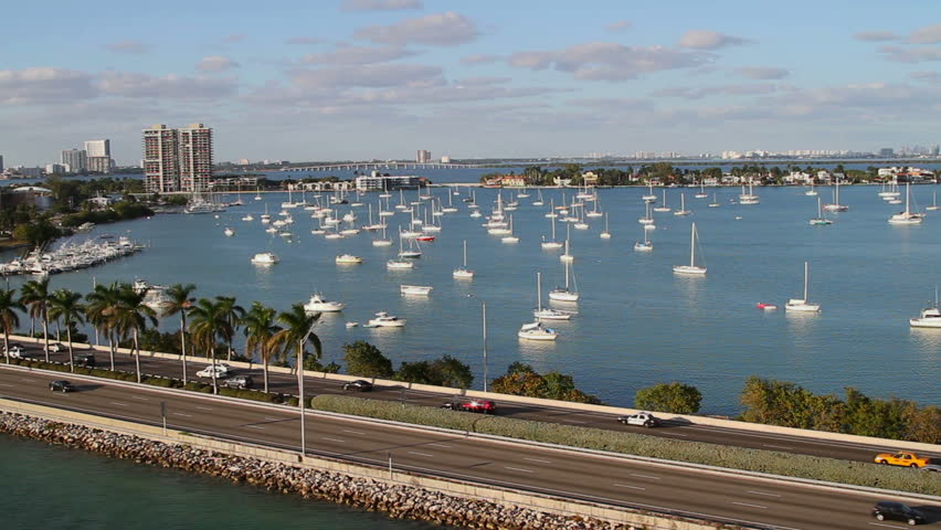 sailboats in miami bay area on a beautiful summer day, aerial view