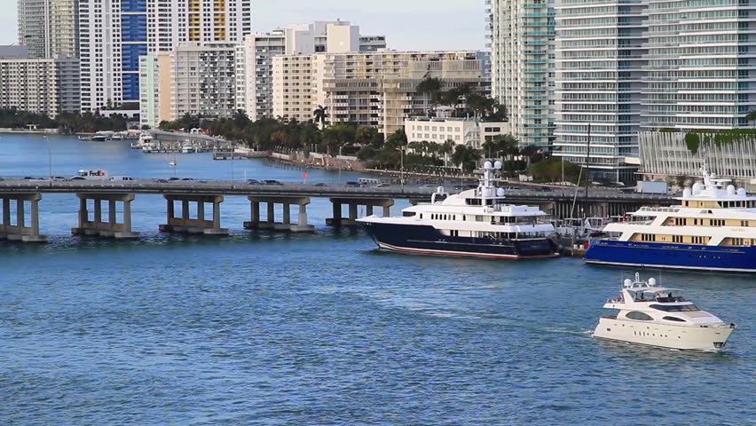 luxury boats in the miami bay area, out for a summer day of fun