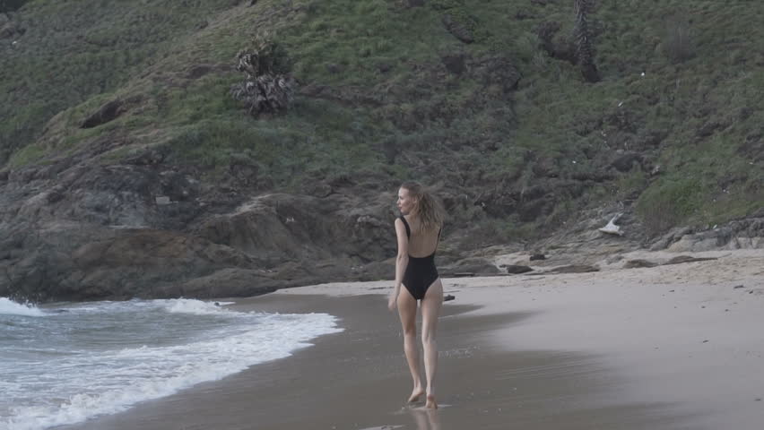 woman in black swimsuit