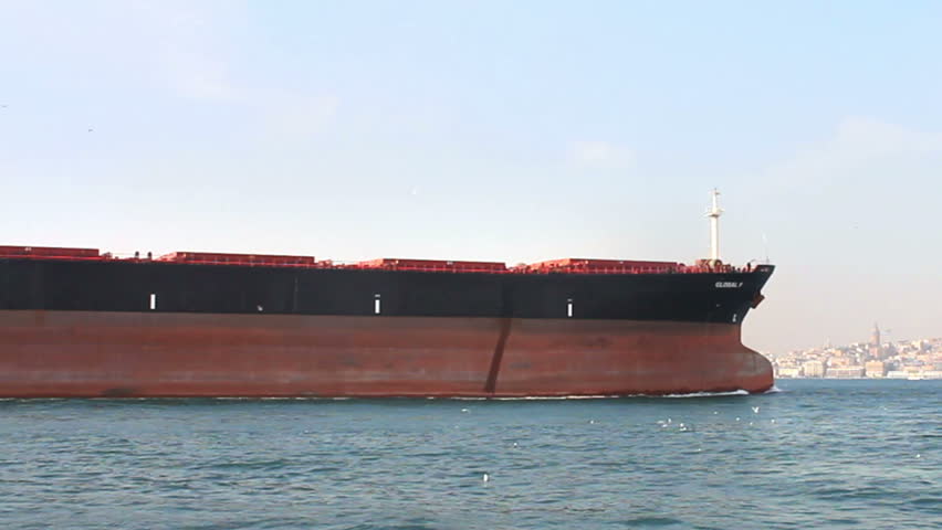 Oil tanker ship sails in the sea. Bow of the large ship
