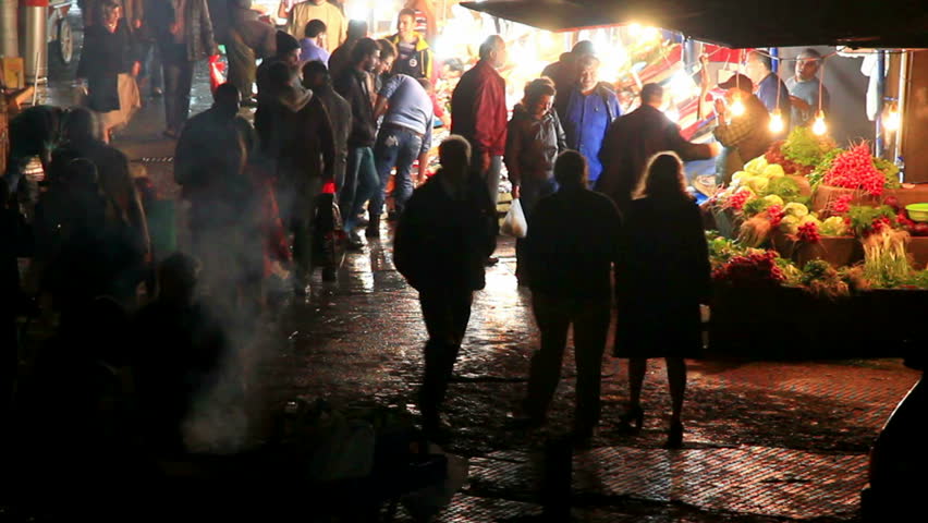ISTANBUL - NOVEMBER 03: Crowd of people shop at Karakoy Fish Market on night,