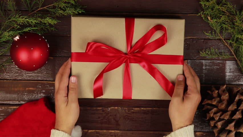 Unwrapping Christmas Presents 2022 Top View Hands Unwrapping Christmas Presents Stock Footage Video (100%  Royalty-Free) 20502307 | Shutterstock