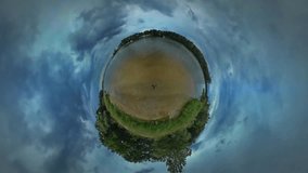 Tiny Little Planet 360 Degree Timelapse. Beach, Coastline of River, Lake, Sea. Landscape, Woodland in Opole. Fresh Green Trees Are Around, Park or Forest, Traveling in Warm Autumn Day. Cloudy Sky.