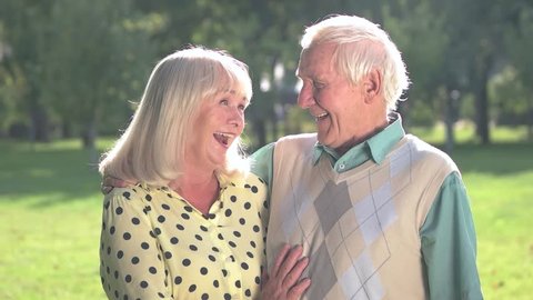 Laughter of senior couple. Man and woman outdoor. Good sense of humour. Mood shapes health.