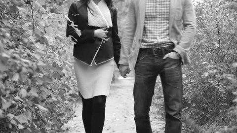 Couple holding hands and walking together