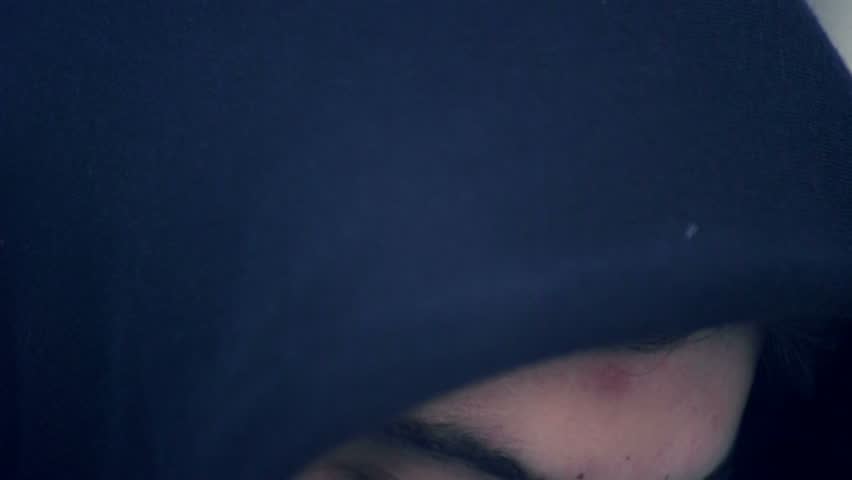 detail of blue eye boy peering