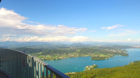 Observing Austria, Klagenfurt lake Worthersee, Klagenfurt city and other Austrian villages near, mountains far away. From Pyramidenkogel, biggest wooden tower in the world with its 100 m (328 ft).