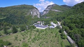 Aerial view over Polovragi Monastery, Romania