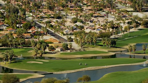 Aerial USA Coachella Palm Springs Golf course city sport outdoor tropical luxury Residential travel vacation tourism building Community wealthy