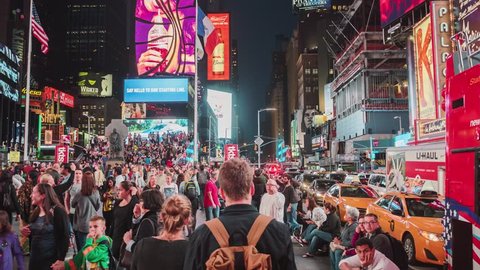 NEW YORK CITY - OCTOBER 07 (TIMELAPSE): Hyperlapse walk through crowd of tourist around Times Square in the evening time on October 07, 2016 in New York, USA.