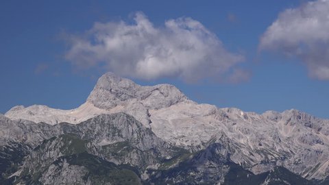 Time lapse footage of cloud forming over Triglav mountain peak in Slovenian Julian Alps