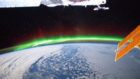 ISS view of Aurora Australis over the Indian Ocean. Created from Public Domain images, courtesy of NASA JSC : http://eol.jsc.nasa.gov. Flare and subtle motion effect