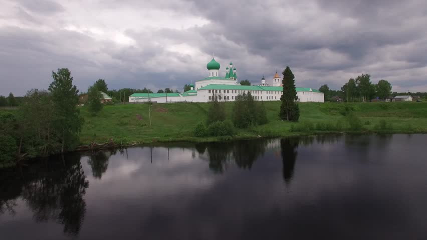 Holy Trinity Alexander Svirsky Monastery. Drone aerial flightower. Beautiful Russian nature. River cruise.