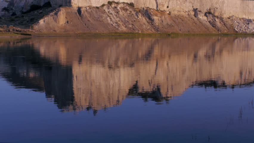 Tilt up reflection of the white cliffs along the Missouri River in Montana along the Lewis and Clark Historic National Trail