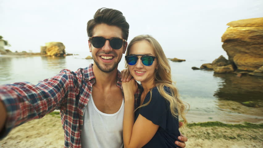 Beautiful couple taking a selfie. Royalty-Free Stock Footage #20597116