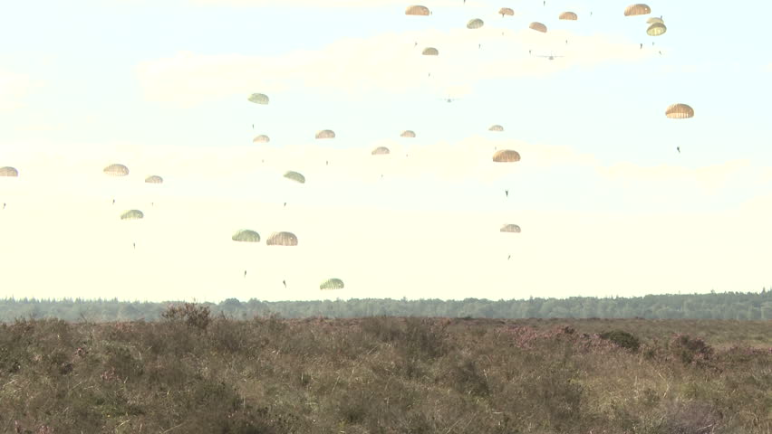 Military parachute drop and landing