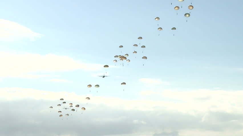 Military parachute drop and landing
