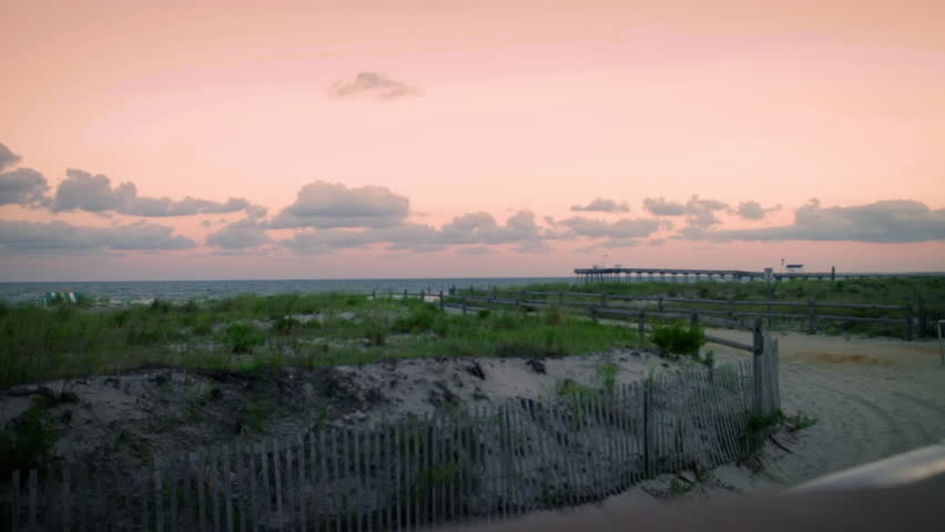The sun setting on the beach, in Ocean City New Jersey